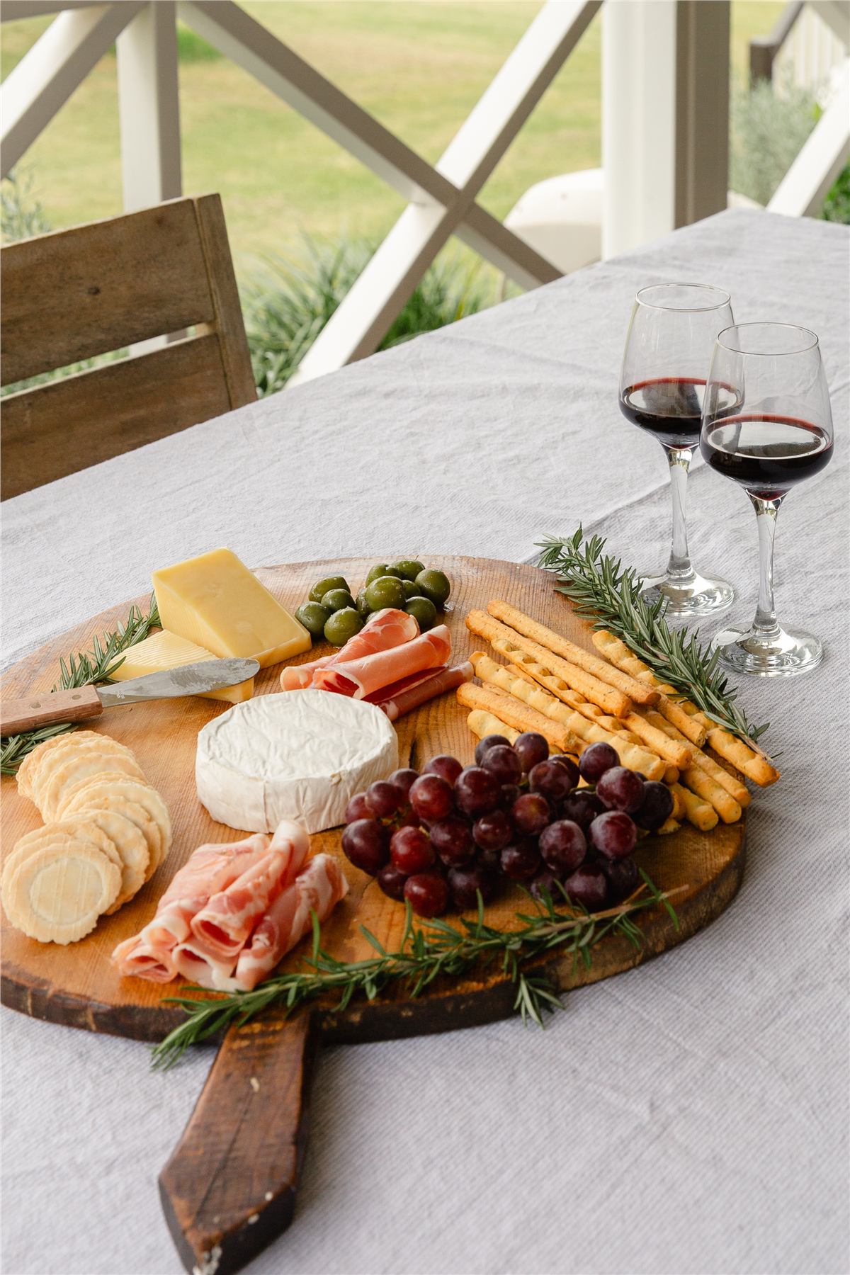 Cheese platter and wine on the deck