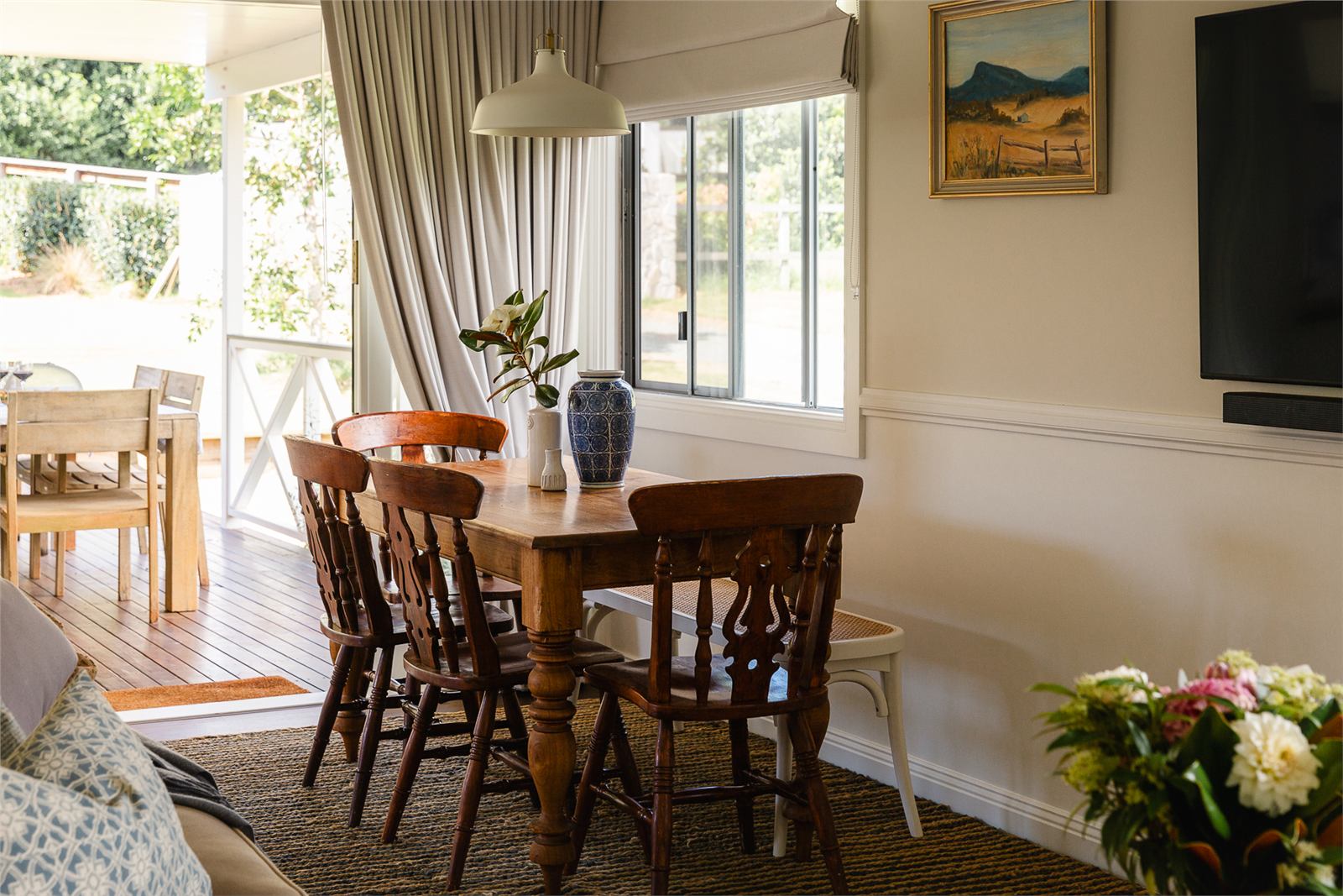 Dining table beside the living room and deck