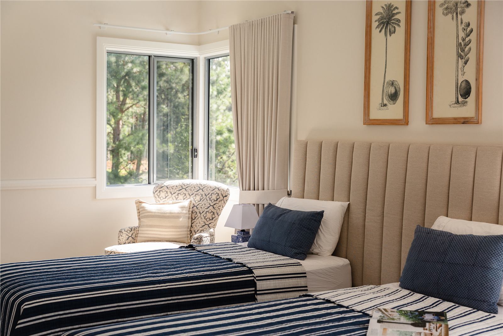 Twin bedroom with striped bedding